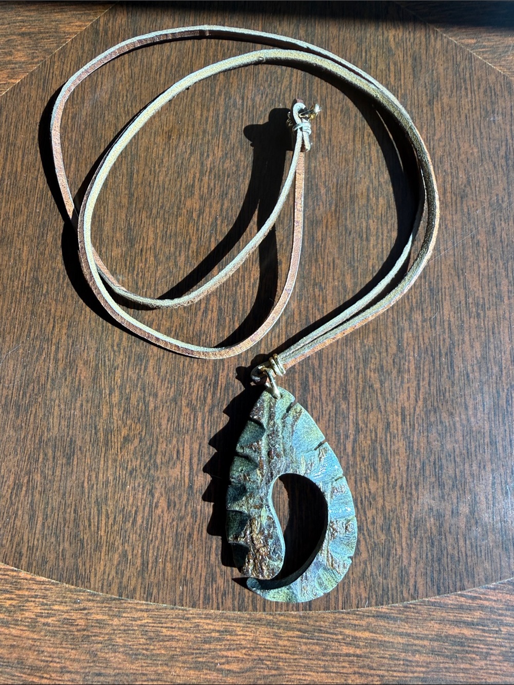 Rustic Leather Cord Necklace with Carved Pendant
